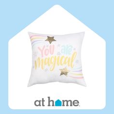 a pillow with the words you are magic on it and gold stars in the background