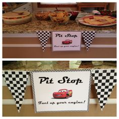 some food is sitting on the counter in front of a sign that says pit stop