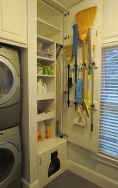 a washer and dryer in a small room