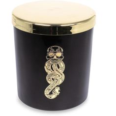 a black and gold canister with a snake on it