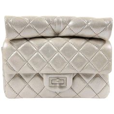 Chanel Silver Leather Roll Handle Reissue Clutch | From a unique collection of rare vintage Clutches at https://www.1stdibs.com/fashion/handbags-purses-bags/clutches/. Silver Chanel Clutch, Red Lizard, Chanel Clutch, Chanel Brand, Rhinestone Clutch, Pink Chanel, Chanel Spring, Leather Roll, Vintage Clutch