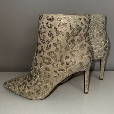 Brand New Gianni Bini Leopard Print Rhinestone Stiletto Booties. Would Come In The Original Box But It’s Beat Up After Moving Even Though The Shoes Have Never Been Worn. I Feel Like These Ran Small As I Normally Wear A 9 But Got These In A Size 10. They Are Stunning And So Sparkly Fun- The Pictures And Video Don’t Do Them Justice. 4” Heel Height. Please Let Me Know If You Have Any Questions! :) Elegant Wedding Boots Embellished, Elegant Embellished Wedding Boots, Elegant Bedazzled Evening Boots, Elegant Evening Bedazzled Boots, Elegant Embellished Almond Toe Boots, Elegant Embellished Boots For Party Season, Glamorous Embellished Wedding Boots, Gold Boots With Rhinestones For Evening, Elegant Evening Boots With Rhinestones