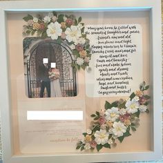 a framed photo with flowers and a poem in the frame that says, i love you