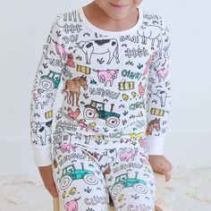 Make your little one's most colorful dreams come to life in these colorable pajamas! Made from our signature bamboo fabric, your kiddos will stay cool and comfortable all while making these PJs creatively their own. Use skin-safe, non-toxic fabric markers to keep your child's sensitive skin protected, all while keeping their masterpiece intact with no color bleeding after washes. Give your kids hours of fun that will not only add some magic into their bedtime routine, but serve as the coziest keepsake for years to come! MARKERS ARE NOT INCLUDED - MUST USE FABRIC MARKERS *PATENT PENDING For Best Results: Place a piece of paper or cardboard underneath the drawing area to prevent bleed through. Wait 24 hours to wash (the color may bleed in first wash, so wash separately.) Fabric markers requi Barnyard Bash, Kids Pjs, Baby Bundles, Fabric Markers, Bedtime Routine, Color Care, Family Pajamas, Bamboo Fabric, Pyjama Set