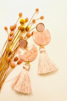 Women Fashion | Shop for women's fashion on Luulla Pink Bohemian Resin Jewelry, Bohemian Pink Resin Jewelry, Pink Bohemian Earrings For Vacation, Pink Dangle Jewelry For Vacation, Pink Tassel Drop Earrings, Adjustable Pink Tassel Drop Earrings, Handmade Pink Dangle Tassel Earrings, Trendy Pink Dangle Tassel Earrings, Pink Adjustable Dangle Tassel Earrings