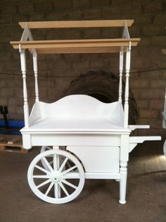 an image of a white cart that is being used as a candy cart for sale