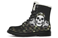 a pair of black and green boots with skulls on them, one has a barbell in the middle