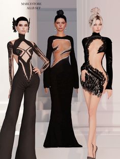 three models in black and gold gowns on the runway