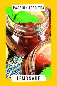 a jar filled with liquid next to lemons and mint