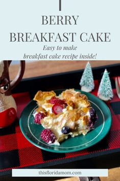 berry breakfast cake on a green plate with red and black checkered table cloth