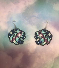 Show your love for Psytrance with these spacey Seven Lions earrings! *Silver Plated hardware for sensitive ears! *Can be customized to match whatever colors you need! *Earring backings included so you can dance all night and not lose them! *Extremely lightweight and don't hurt your ears at all! Silver Rave Jewelry For Gift, White Rave Jewelry For Gift, Seven Lions Perler, Britney Spears Costume, Perler Earrings, Lion Earrings, Dance All Night, Perler Ideas, Easy Perler Beads Ideas