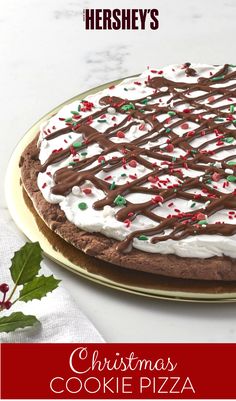 there is a christmas cookie pizza on the plate