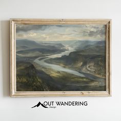 a painting hanging on the wall above a river