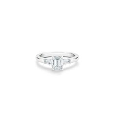 DB Classic emerald-cut and tapered diamond ring | De Beers US Fire Life, Emerald Cut Diamond Engagement Ring, Diamond Stacks, Platinum Engagement Rings, Baguette Cut Diamond, Jewelry Images, Engraved Items, Emerald Cut Diamonds, Emerald Cut