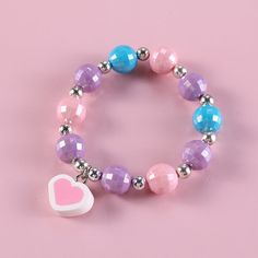 This cute unicorn set is the perfect gift for your little girl or grand child. Perfect for girls age 3 to 11 years old. Trendy Purple Jewelry With Heart Beads, Adjustable Purple Charm Bracelet For Birthday, Cute Purple Beaded Bracelets For Birthday, Cute Purple Bracelets For Birthday, Trendy Purple Jewelry For Birthday, Playful Purple Beaded Bracelets As A Gift, Playful Purple Beaded Bracelets As Gift, Playful Purple Beaded Bracelets For Gifts, Playful Purple Beaded Bracelets For Birthday