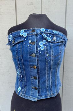 Women's XL, can be made in other sizes and flower colors. Measurements available upon request Fitted Floral Summer Tops, Fitted Floral Embellished Summer Tops, Fitted Floral Embellished Tops For Summer, Fitted Floral Embroidery Tank Top For Spring, Casual Fitted Vest With Floral Embroidery, Painted Clothes Diy, Upcycled Jeans, Flower Colors, Upcycle Jeans