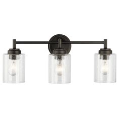 three light bathroom fixture with clear glass shades on the bulbs and an oil rubbed bronze finish