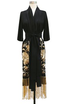 The glamorous 1920s inspired Trashy Diva Flapper Robe in our soft and luxurious rayon crepe de chine is perfect for lounging! The Art Deco robe details gorgeous Asian-inspired black floral embroidery with black hand knotted fringe trim around the bottom. This original design features a clean front with no pockets and a simple sash. Perfect as a loose fit jacket or a lingerie robe, this wrap is below the knee and features generous length sleeves (could be cuffed neatly). Wear this kimono style ro Trashy Diva, Mode Kimono, Looks Street Style, 1920s Fashion, Luxury Lingerie, Vintage Lingerie, Mode Inspiration, Kimono Fashion, Look Fashion