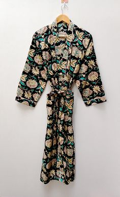 "HandicraftTex presenting good looking Cotton kimono robes which are perfect for lounging around the home or spa. Use our Bird print robe as a cover up on the beach or after a dip in the pool. Add a luxe, boho feel to your bridal shower. Versatile, soft and luxurious, our 100% cotton kimono robes are printed with azo-free dyes. The printed robe features 3/4th sleeves, a waist tie and two front pocket.Indian Kimono, Kimono, Cotton Robe, Robes, Dressing Gown, Women Wear, fridakahloprint robe, bridal shower, soft, Kimono Robes,dressing gown women, cotton bath robe, kimono robe, cotton robe, womens bath robe, womens dressing gown, robe, boho, vintage, dressing gown, loungewear, kimono, cotton Size - One size will fit sizes S to XL Length - 48 inches (125 Centimeter), mid calf Note: Girl wear t Black Spring Sleepwear For Home, Black Summer Loungewear Robe, Black Cotton Kimono With Print, Black Printed Cotton Kimono, Black Cotton Printed Kimono, Black Relaxed Fit Kimono With Kimono Sleeves, Black Kimono With Relaxed Fit, Persian King, Indian Kimono