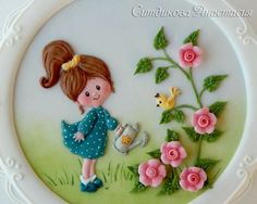 a cake with a girl and flowers on it