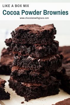 a stack of chocolate brownies sitting on top of a white plate next to each other