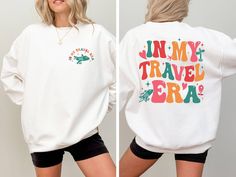 In My Travel Era Sweatshirt, Traveler Sweatshirt, Travel Gift, Vacation Sweatshirt, Adventure Sweater, Traveler Gift, Funny Travel Sweater  **Discover Comfort and Durability - Our sweatshirts are expertly crafted from a blend of 50% cotton and 50% polyester, ensuring both comfort and durability. - Featuring a medium-heavy fabric weighing 8.0 oz/yd² or 271.25 g/m², they provide optimal warmth and coziness. - Designed with a loose, unisex fit, our sweatshirts offer versatility for various occasion Travel Sweater, Funny Travel, Travel Humor, Travel Gifts, My Travel, Heavy Fabric, Favorite Outfit, Perfect Fit, Adult Outfits