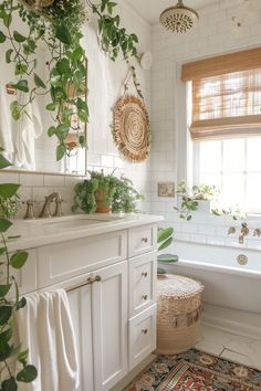 a white bathroom with plants hanging on the wall and a bathtub in the corner