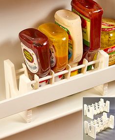 a shelf filled with different types of condiments