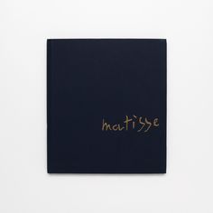 a black book with gold writing on the cover that says,'nattisse '