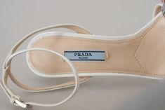 PRADA Gorgeous brand new with tags, 100% Authentic PRADA ankle strap heels shoes. Model: Heels sandals Color: Silver, White Leather bottom sole Logo details Made in Italy Very exclusive and high craftsmanship Material: 100% Leather Designer Ankle Strap Heels With Heel Loop, Luxury Heels With Ankle Strap, Luxury Heels With Ankle Strap And Heel Strap, Designer Heels With Sculpted Heel And Ankle Strap, Designer Heels With Ankle Strap, Designer Heels With Ankle Strap And Sculpted Heel, Luxury Heels With Heel And Ankle Strap, Designer Heels With Ankle And Heel Strap, Designer Heels With Ankle Strap And Padded Heel