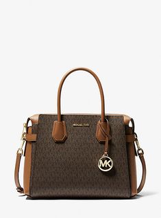 Our Mercer belted satchel is a study in understated glamour. Crafted from a luxe blend of Signature-print canvas and pebbled leather, this timeless design opens to a pocketed interior sized to store a day’s worth of essentials. Adjust its shoulder strap to wear it as a crossbody bag. Michael Kors Luggage, Sac Michael Kors, Timeless Bags, Michael Kors Backpack, Michael Kors Mercer, Michael Kors Satchel, Michael Kors Shoulder Bag, Zip Tote, Purses Michael Kors