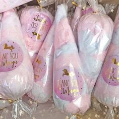 unicorn lollipops are wrapped in plastic bags with the words i love you on them