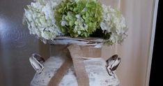 a vase filled with flowers on top of a table