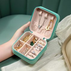 an open jewelry box on a table