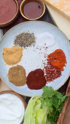 The homemade fajita seasoning ingredients on a white plate. Spice Combinations