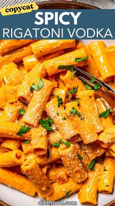 a plate full of rigatoni vodka pasta with parsley on top and the title spicy rigatoni vodka