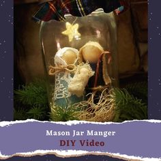 mason jar manger diy video with christmas decorations in it and the text mason jar manger diy video