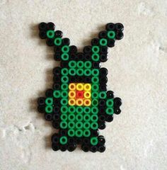 an image of a beaded animal made out of beads