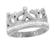 a white gold crown ring with diamonds