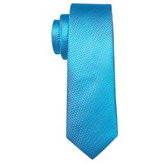 If you're seeking a distinctive touch to elevate your ensemble, explore our Sky Blue Ornament XL Tie Set at Sophgent. The tie is made of high-quality silk, giving it a luxurious feel and ensuring it will hold its shape well. Whether you're attending a wedding, a job interview, or a night out on the town, this tie is sure to make a statement. Add it to your collection today and elevate your style. 100% Silk Handmade Includes: Tie, Pocket Square and Cufflinks Length: 63" Width: 3.34" Warm iron if Luxury Blue Ties For Business, Blue Standard Tie For Business, Blue Tie For Formal Father's Day, Elegant Blue Suit And Tie Accessories For Father's Day, Elegant Blue Tie For Business, Elegant Blue Suit And Tie Accessories For Office, Modern Blue Ties For Business, Modern Blue Tie For Business, Luxury Blue Suit And Tie Accessories For Semi-formal Occasions