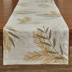 an image of a table runner with leaves on it