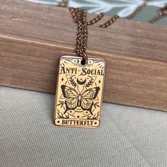 "Embrace your unique style with our Personalized Anti-Social Butterfly Necklace. This one-of-a-kind necklace features the captivating \"Anti-Social Butterfly\" design that represents your individuality and charm. Engraved on high-quality stainless steel, it comes in elegant gold, silver, and rose gold colors, ensuring a timeless and durable piece of jewelry. Express yourself confidently as this necklace is waterproof and anti-tarnish, ready to accompany you on all your adventures. Whether it's a