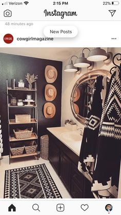 an instagram photo of a bathroom with black and white decor