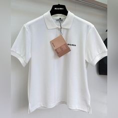 Miu Miu Polo Embroidered Logo Shirt Ss24 Miu Miu Cotton Collared Tops, Miu Miu Collared Cotton Tops, Classic Miu Miu Cotton Tops, Classic Cotton Miu Miu Tops, Casual Collared Tops By Miu Miu, Casual Miu Miu Tops For Spring, Logo Shirt, Polo Shirts, Cream White