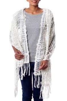 From Sandeep Malhotra this novel shawl is trendy and lightweight. Ivory yarns in varying thicknesses flow together in a voluptuous open weave wrap. Luxury Chikankari Pashmina Shawl For Festivals, White Bohemian Shawl For Spring, Bohemian Cream Shawl Wrap, Cream Shawl Scarf One Size, Cream Bohemian Wrap Shawl, White Shawl For Spring, Cream One-size Shawl Scarves, White One-size Scarf For Spring, One-size White Shawl For Summer