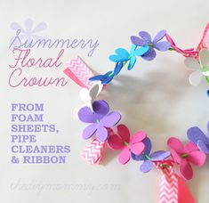 a wreath made out of paper flowers on a white background with the words summer floral crown from foam sheets, pipe cleaners and ribbon