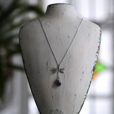 Raw amethyst crystal pendant hanging from a small dragonfly pendant in antiqued sterling silver plate.   On 18" of chain. Raw Amethyst Crystal, Amethyst Pendant Necklace, Amethyst Necklace Pendant, Dragonfly Pendant, Raw Amethyst, Eye Ring, Amethyst Pendant, Amethyst Crystal, Perfect Ring