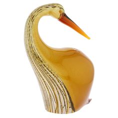 a yellow glass bird with an orange beak