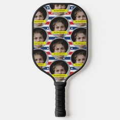 a tennis racket with pictures of people on it