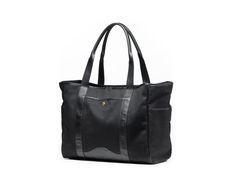 A tote that carries it all -- from passports to beach essentials, to office necessities and farmer's market finds-- the choice is yours. Office Necessities, Key Clip, Beach Essentials, Market Tote, Luxurious Design, Farmer's Market, Black Tote, Classic Leather, Black Tote Bag